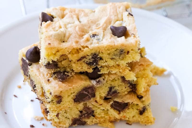 cookie mix cake bars with chocolate chips on white plate