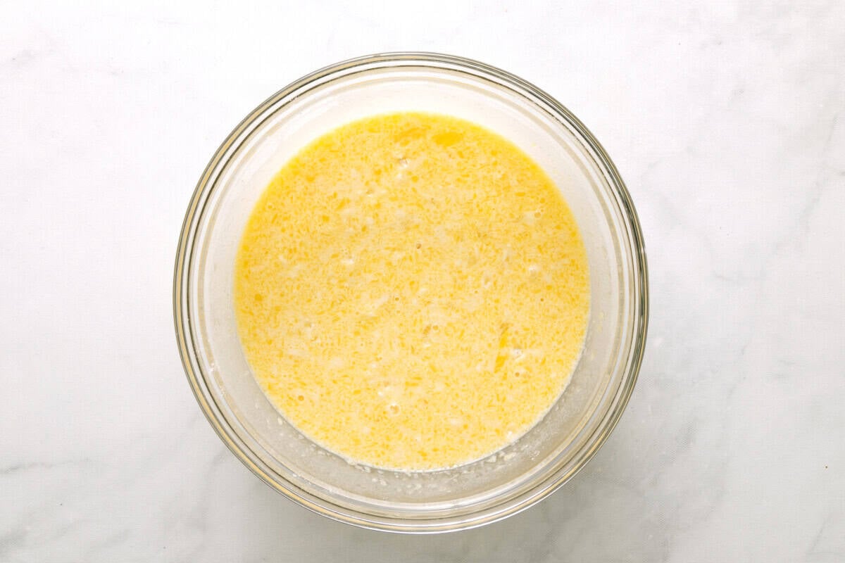 Coconut pie filling in glass bowl.