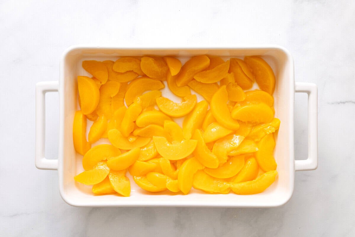 Peaches in baking dish.
