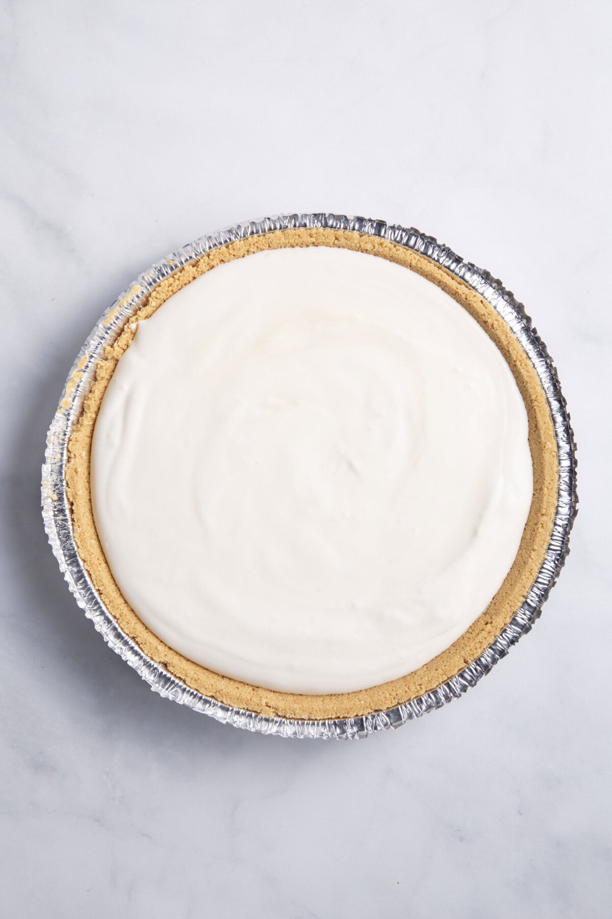 3-ingredient no-bake cheesecake in store-bought graham cracker crust.