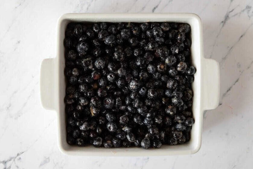 Blueberry filling in baking dish.