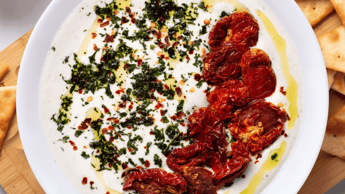 overhead view of feta cheese dip in a bowl