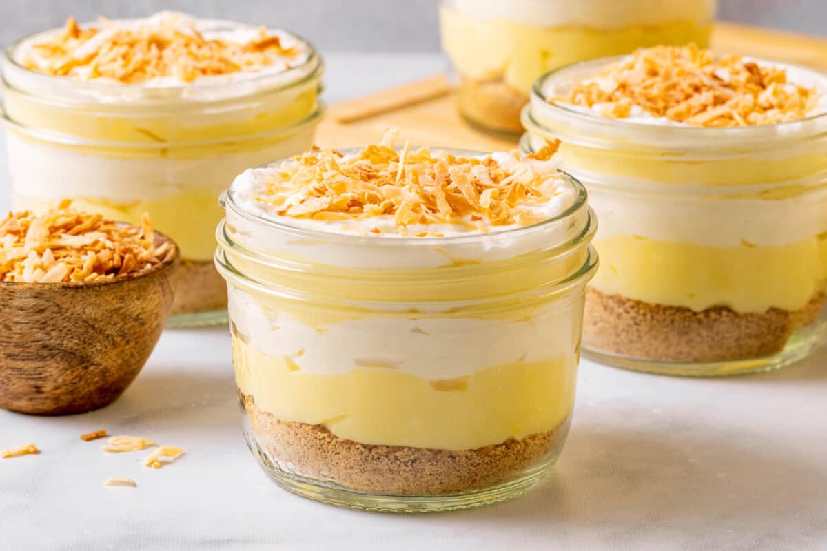 Jars filled with coconut cream pie parfait