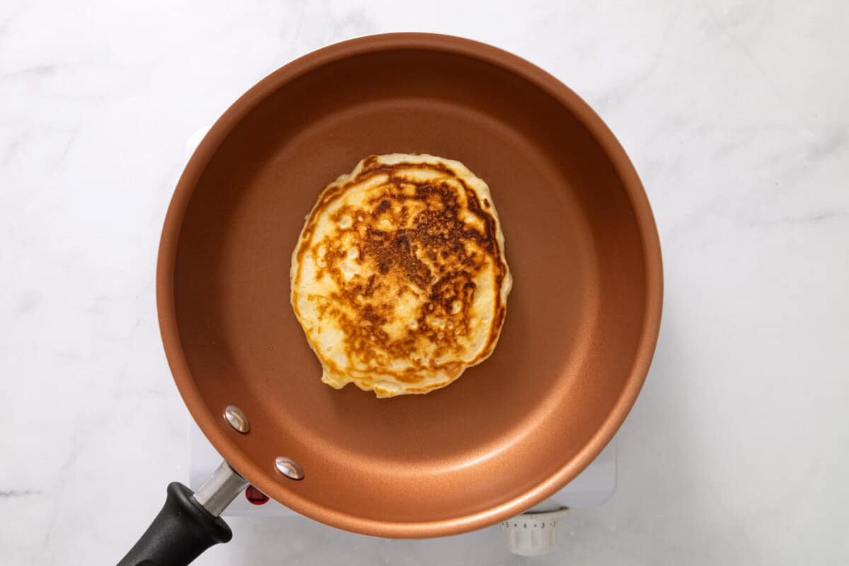Homemade pancake in skillet.