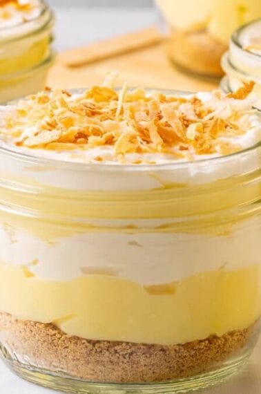 Jars filled with coconut cream pie parfait