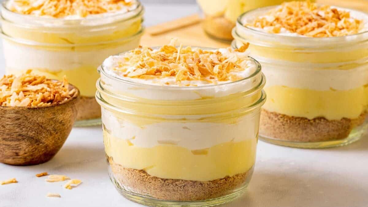 Jars filled with coconut cream pie parfait
