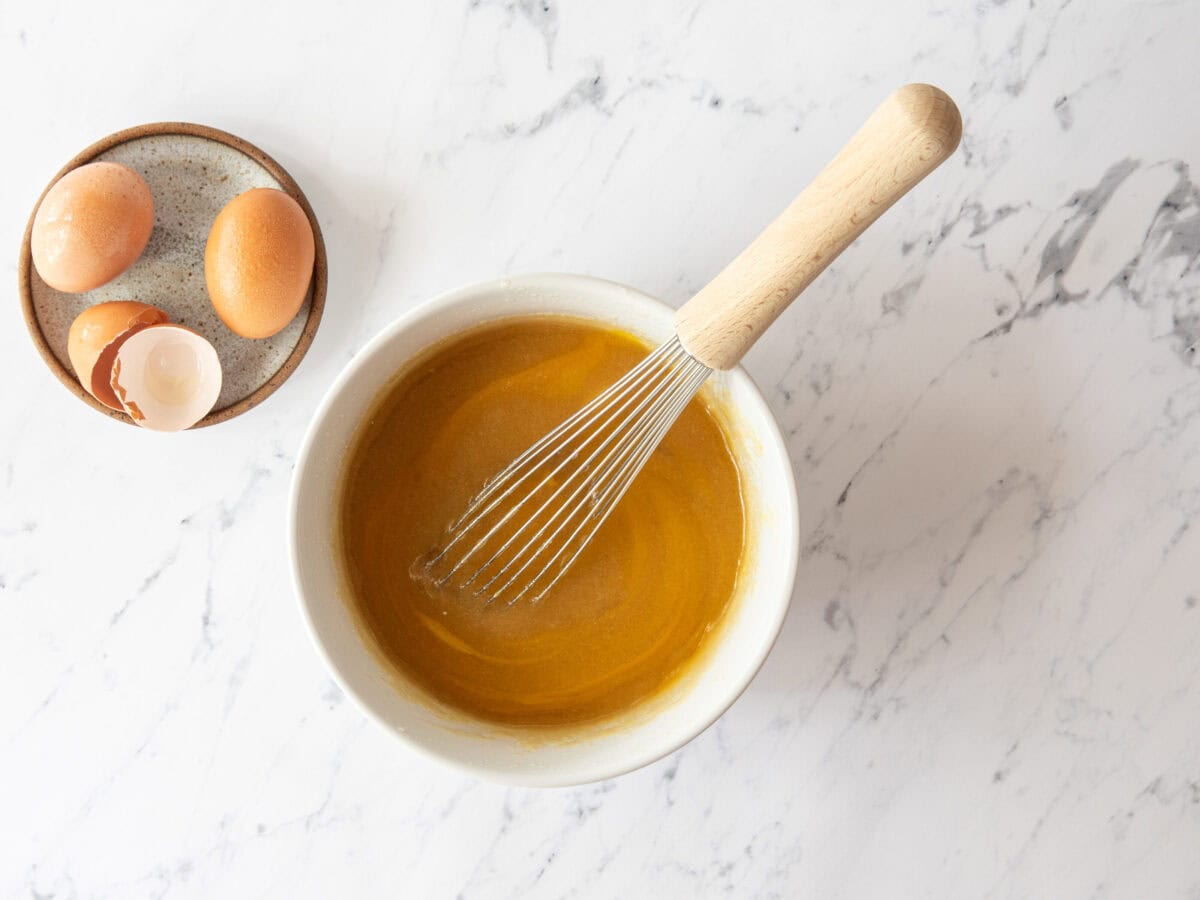 Whisk in bowl with beaten eggs.