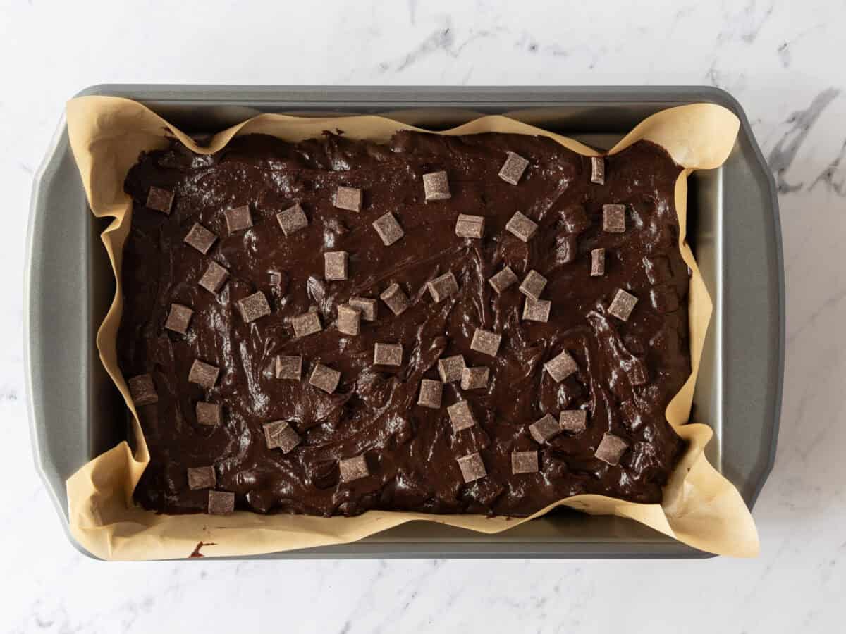 Brownie batter in pan before baking.