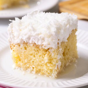 Coconut poke cake made with box cake mix.