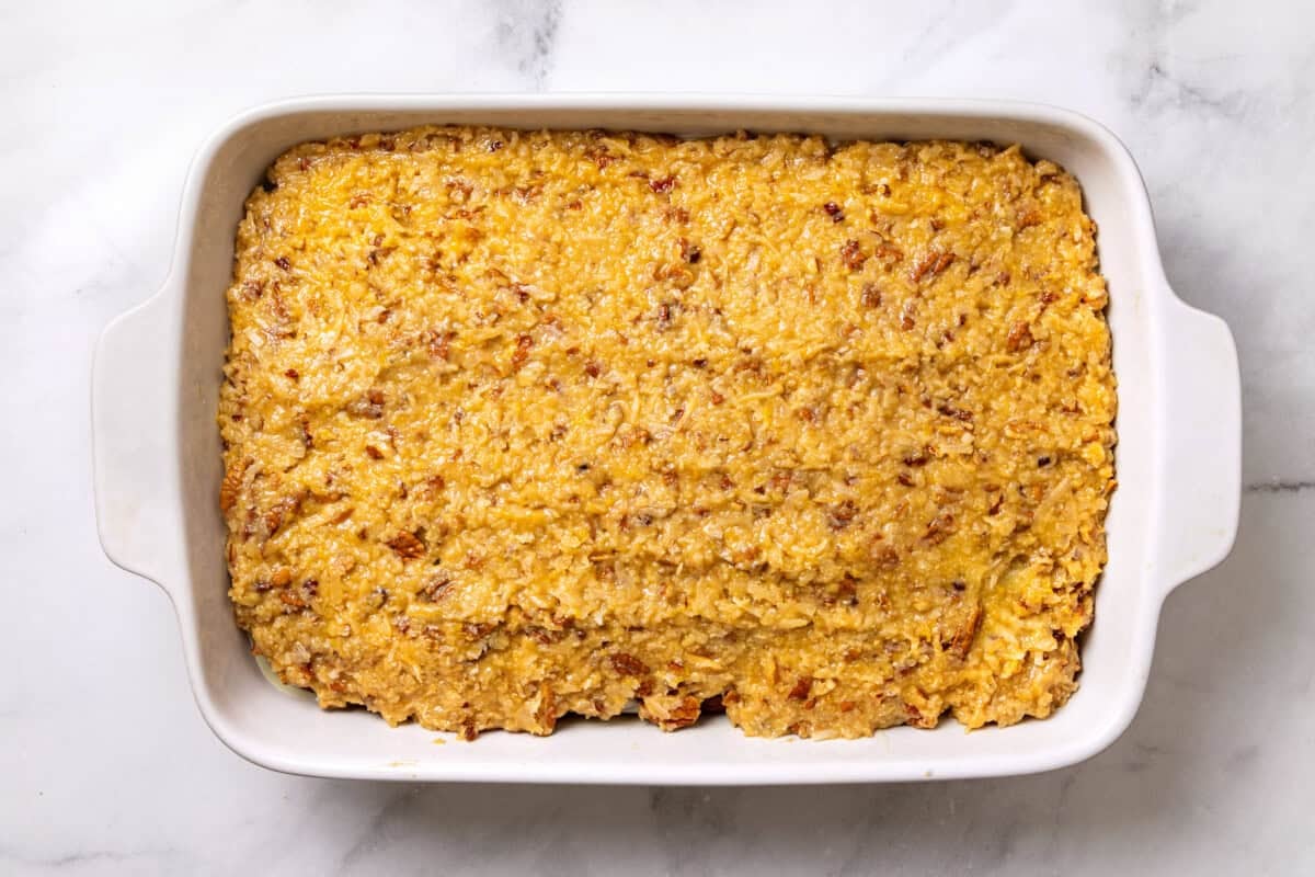 Topping added to German chocolate poke cake.