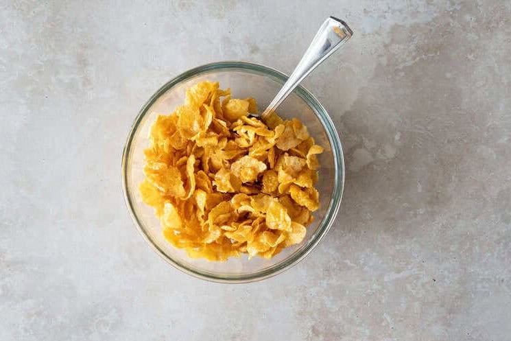 corn flake topping in bowl with spoon.