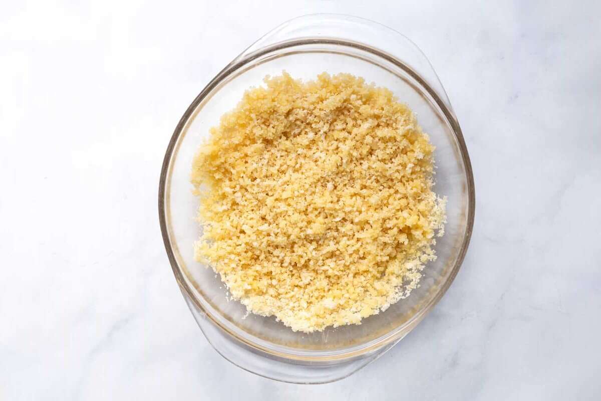 Breadcrumb topping a glass bowl for leftover turkey casserole.