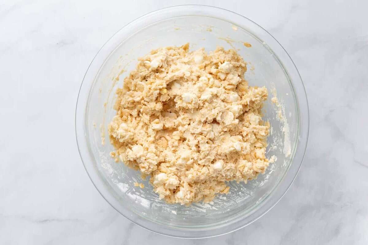 rice krispie cookie dough batter in a clear glass bowl.