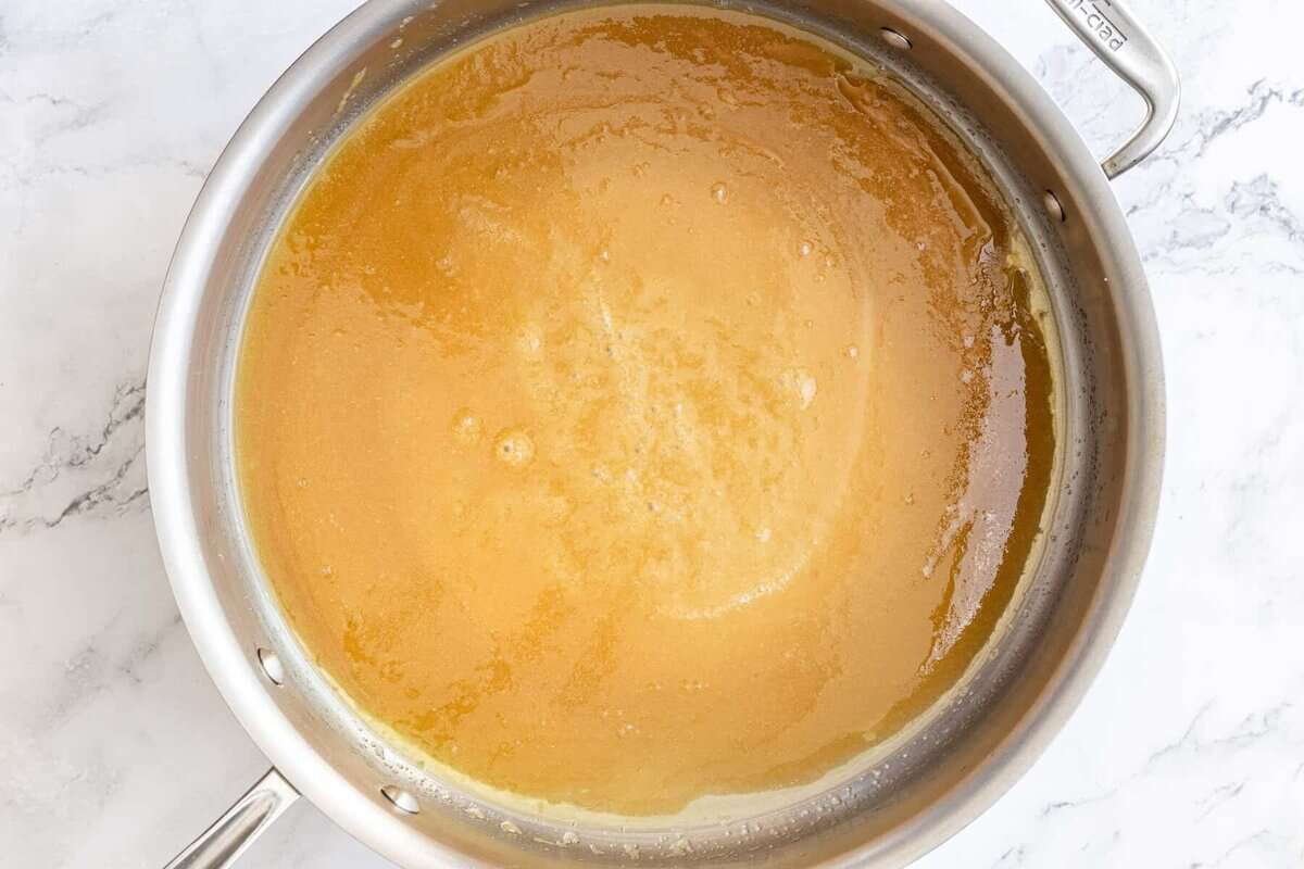 Butter and sugar melted for sautéed apples.