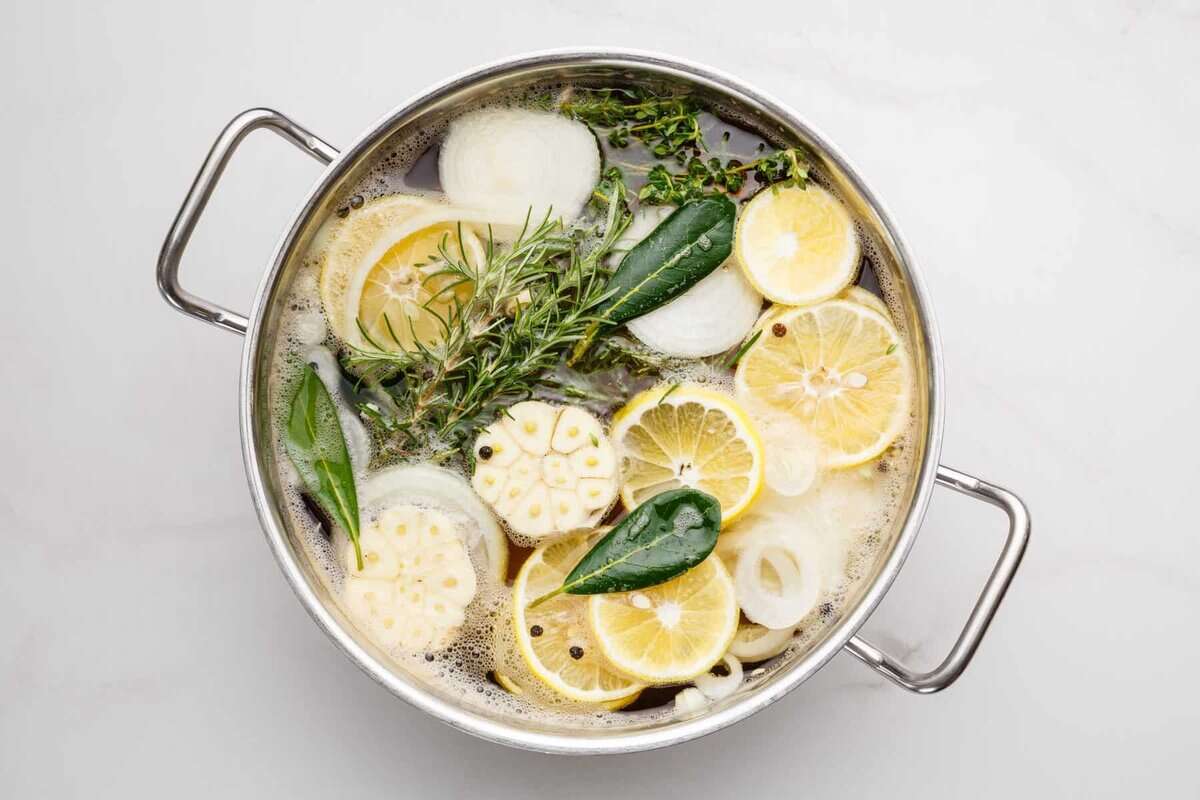 Turkey brine simmering in pot.