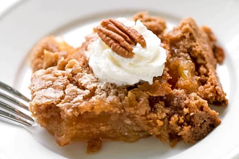 This apple dump cake is the easiest dump cake recipe, with three basic ingredients. If you are looking for an easy fall dessert, this recipe is just that.  Tender bits of apple in every bite covered with a spiced cake that is delicious, down to the last bite. An easy apple dessert you can whip up any time of day. #apple #dessert #dumpcake #falldessert #appledessert #easydesserts| allthingsmamma.com