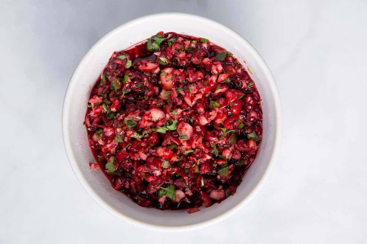 Cranberry jalapeño topping mixture in bowl.
