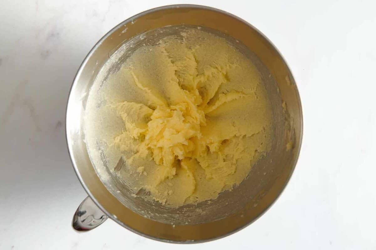 Creamed butter and sugar in mixing bowl.