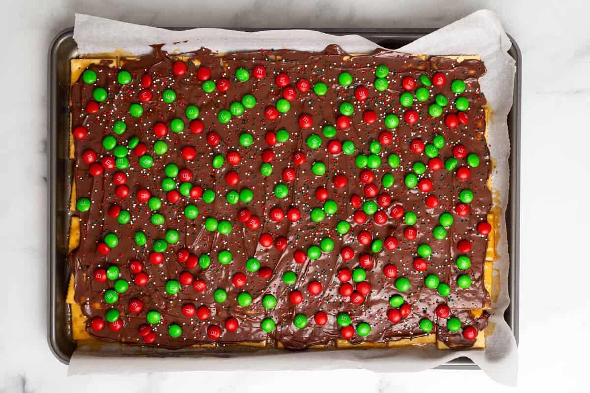 Holiday sprinkles and M&Ms added to Christmas crack.