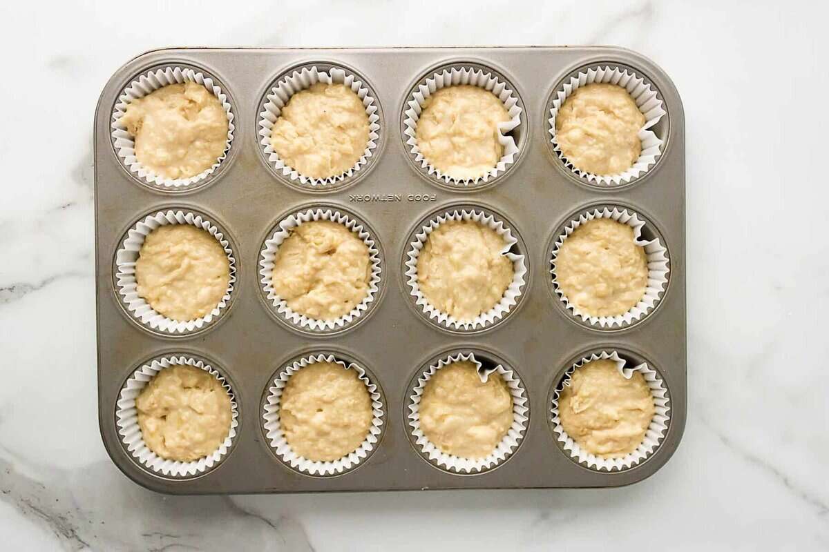 Banana muffins in pan before baking.