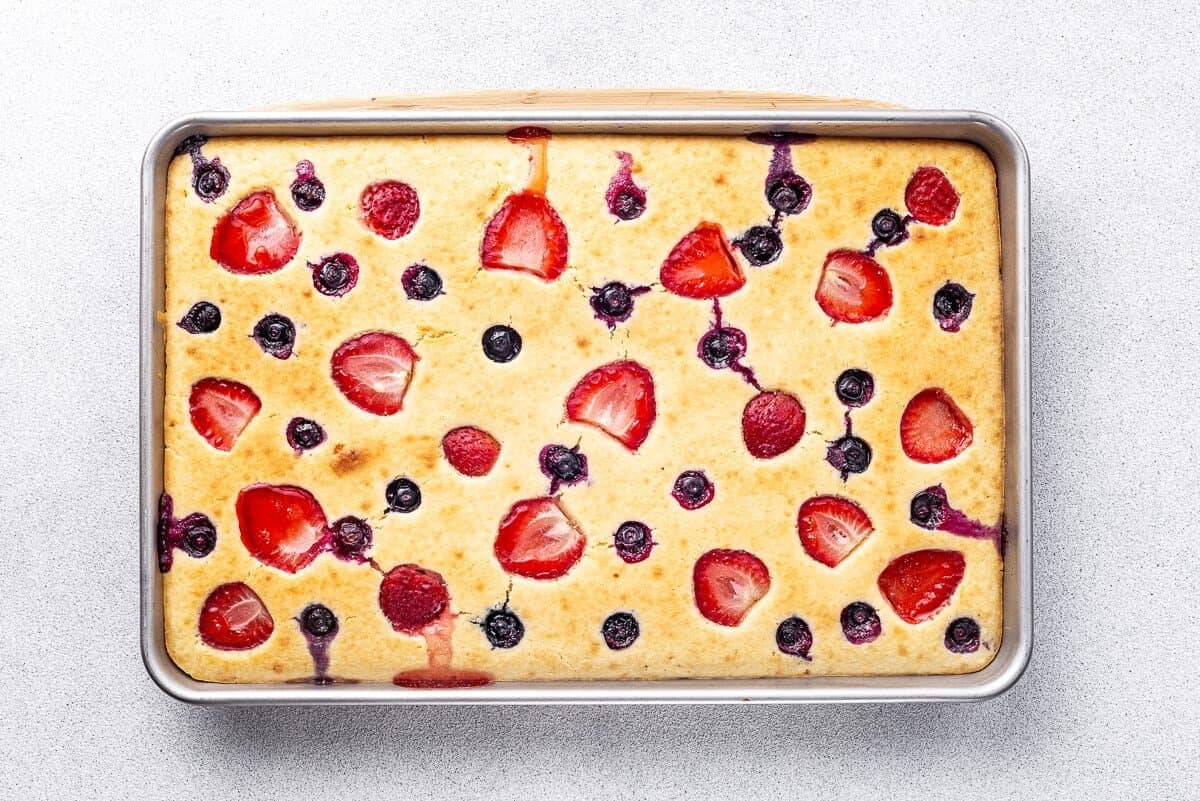 Sheet pan pancakes with berries.