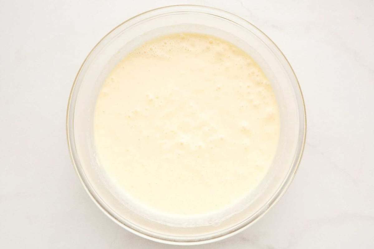 Buttermilk waffle batter in bowl.