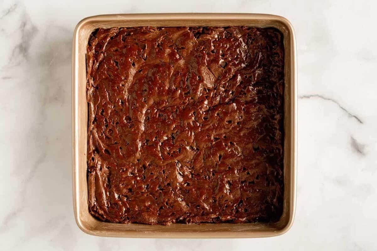 Batter in pan for cakebox brownies.