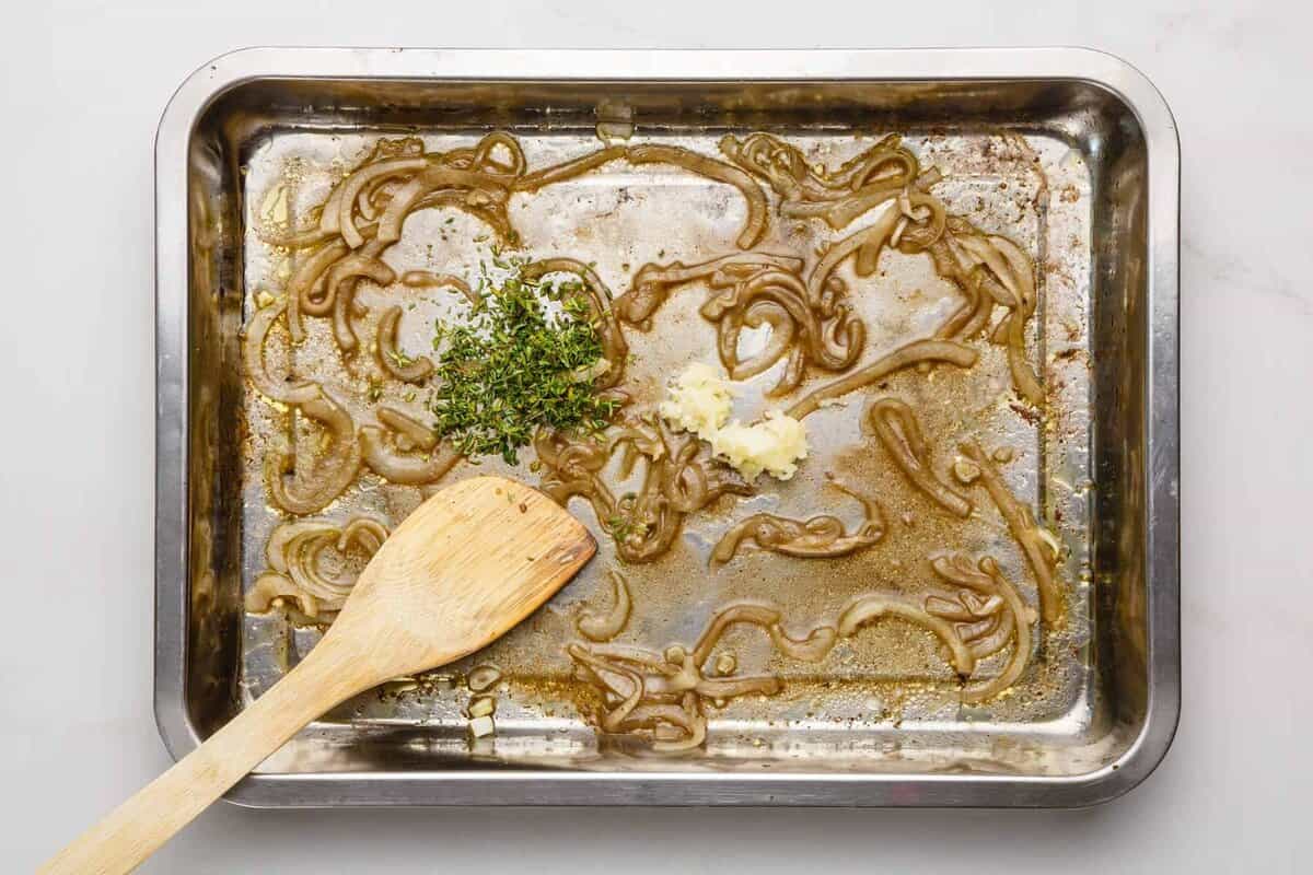 Ingredients for French dip au jus on sheet pan.