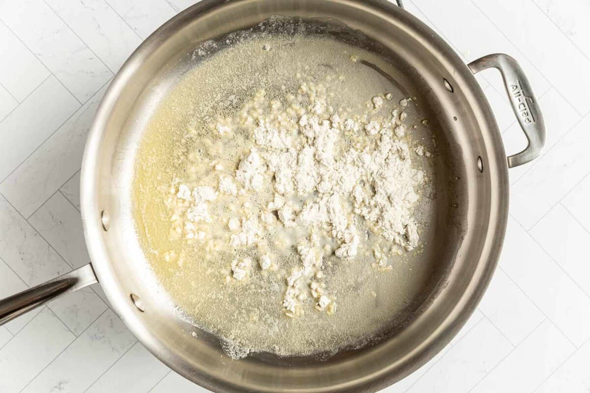 Flour added to pot of melted butter.