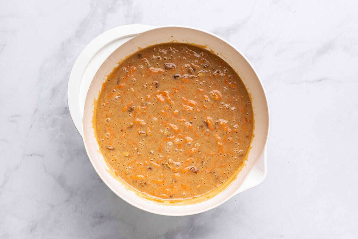 Carrot cake batter in mixing bowl.