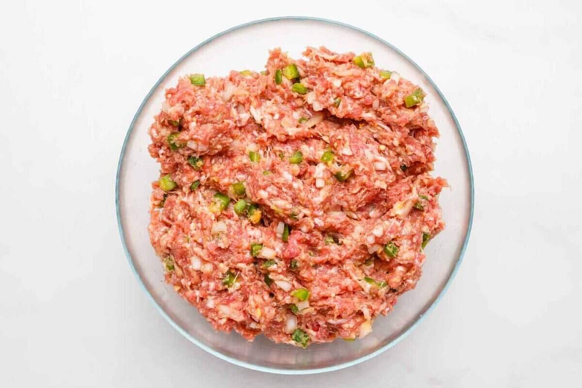 Southern meatloaf mixture in glass bowl.
