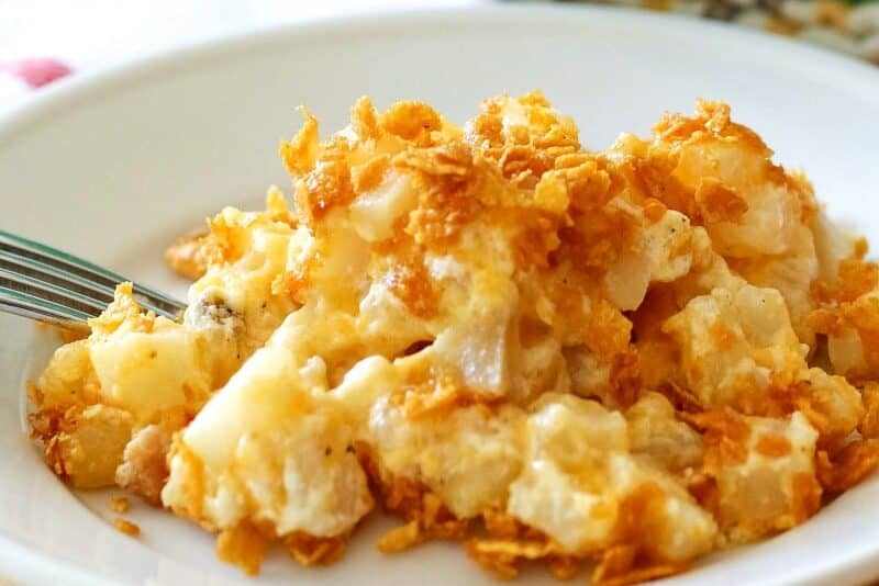 Made with simple ingredients, this Easy & Delicious Cheesy Potato Casserole Recipe is a must-have for any get-together you host!