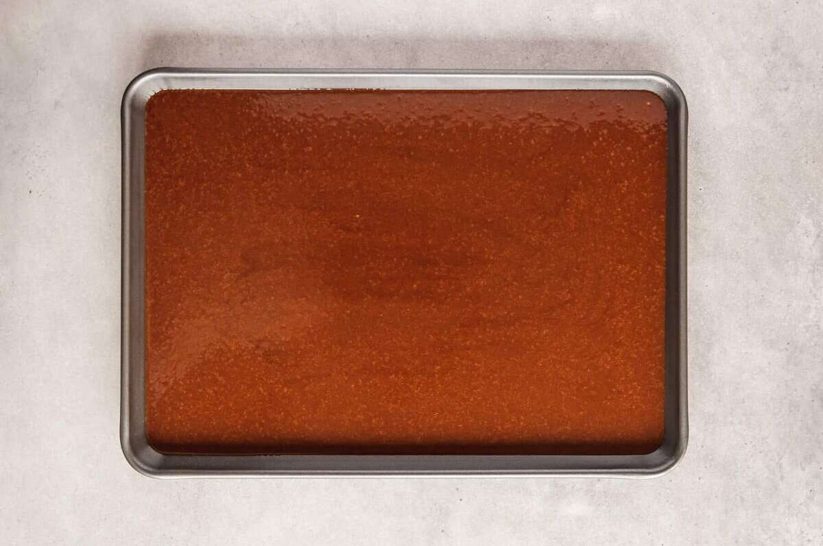 Batter for Texas sheet cake in pan.