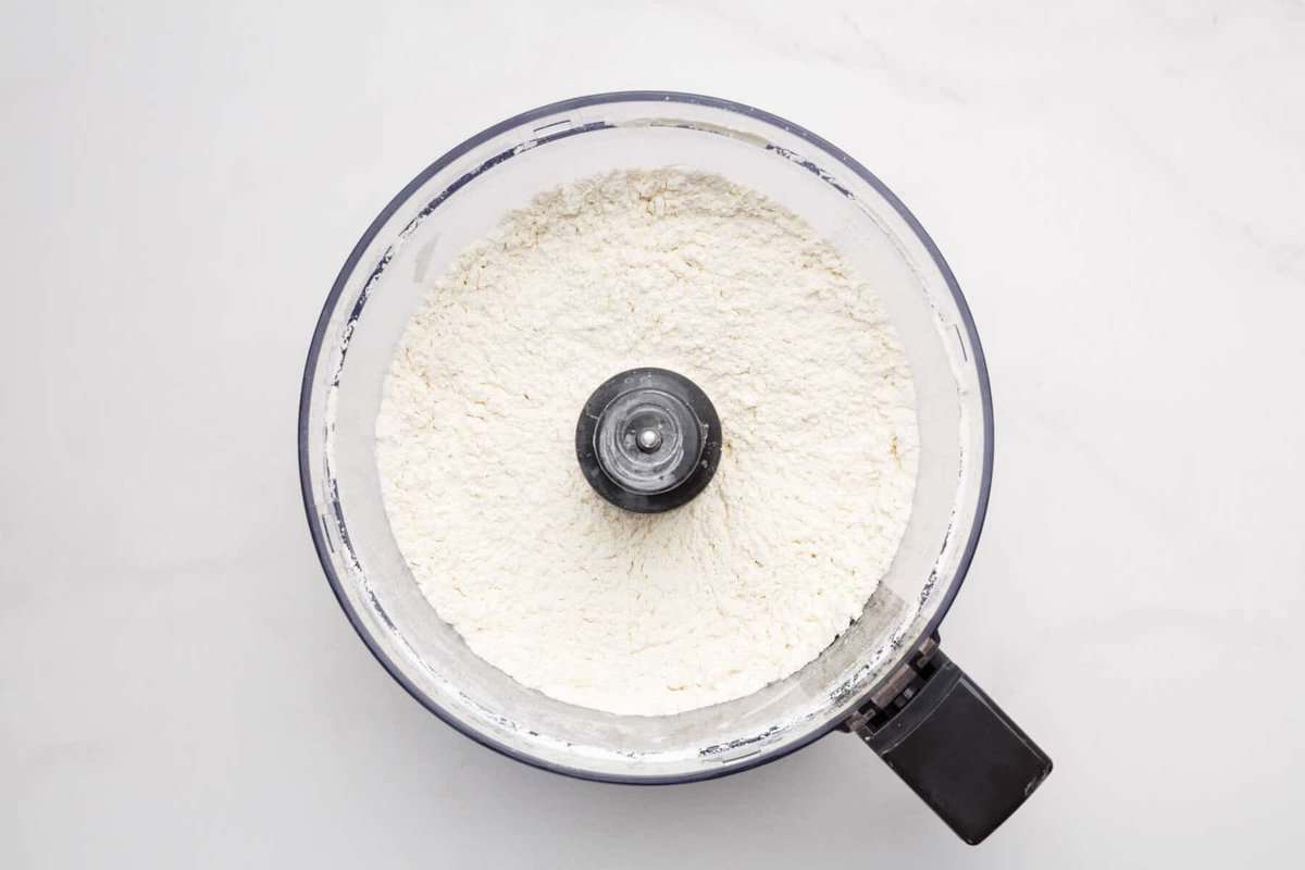 Dry ingredients in food processor.