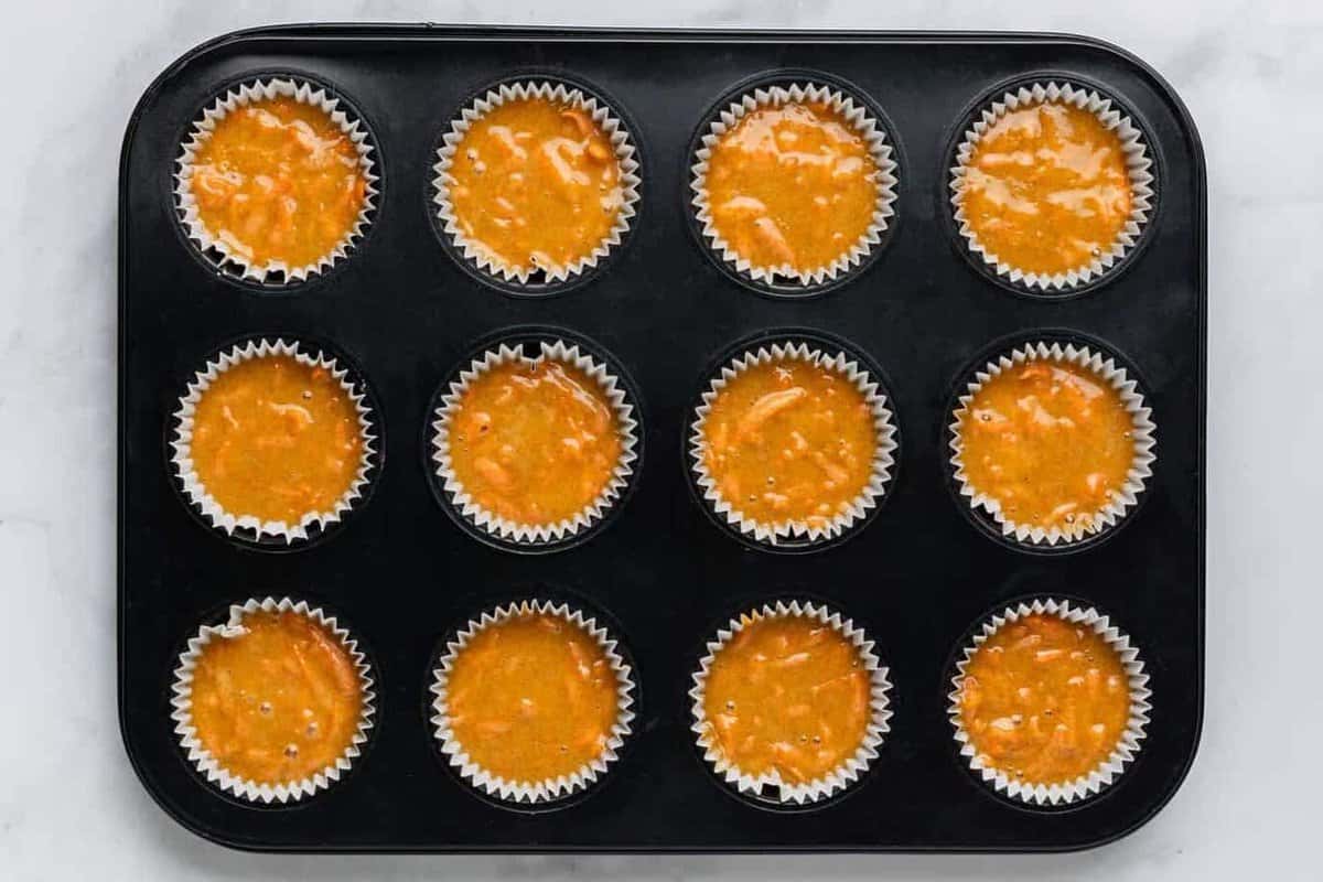 Unbaked carrot cake muffins.