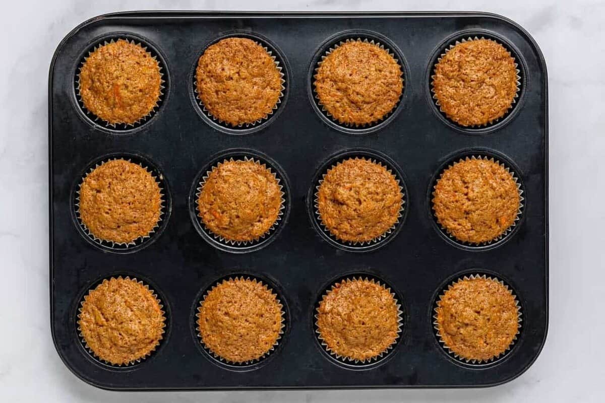 Carrot cake muffins in pan.