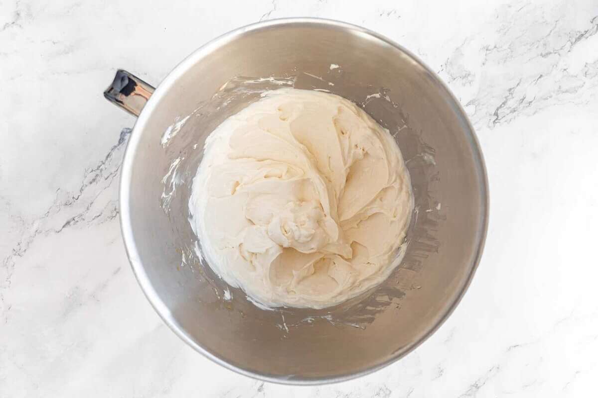 Cheesecake fruit dip in mixing bowl.