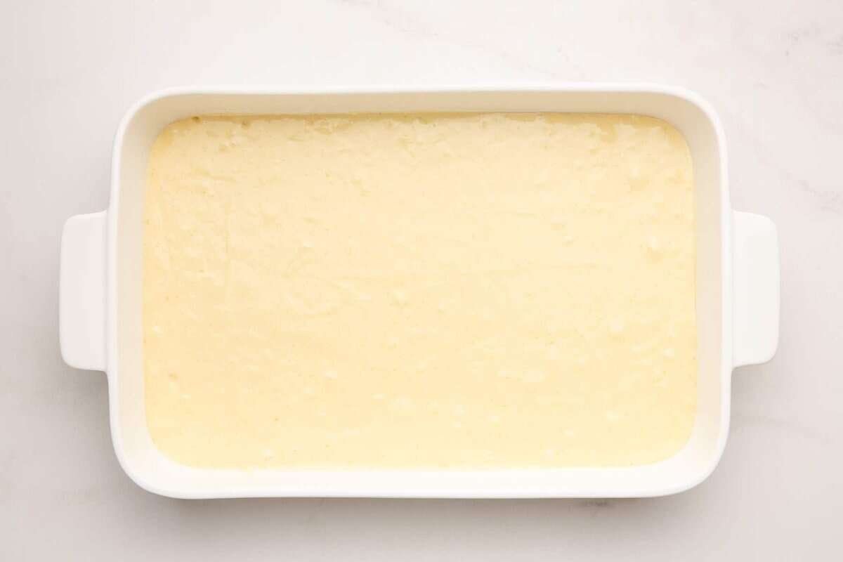 White cake batter in pan.