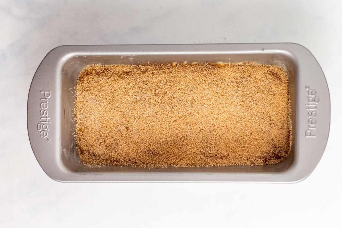 Cinnamon swirl layer added to bread pan.