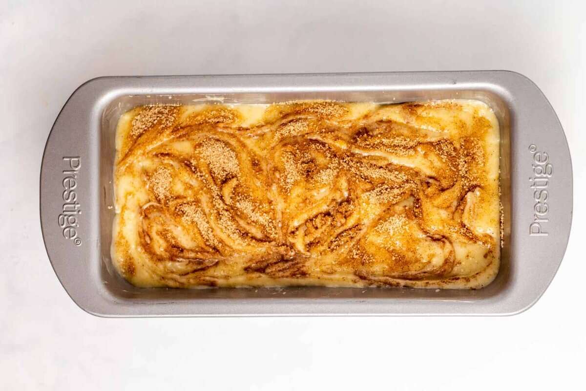 Cinnamon swirl bread in pan before baking.