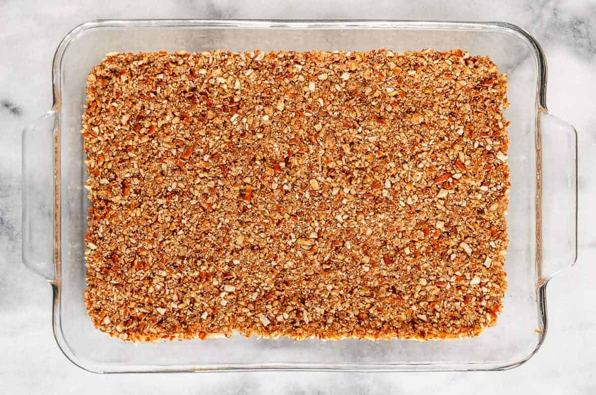 Pretzel crust in casserole dish.