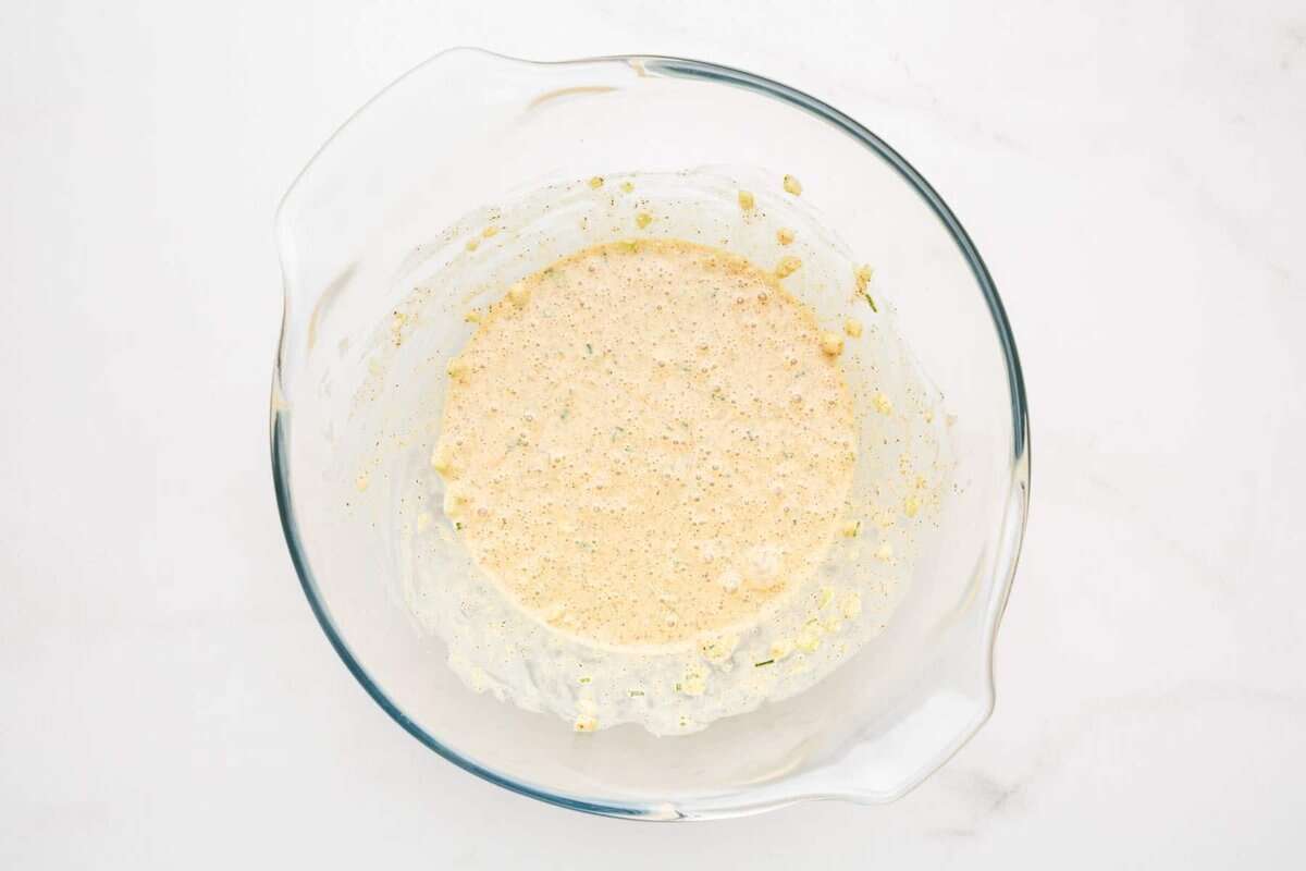 Crab cake base in glass bowl.