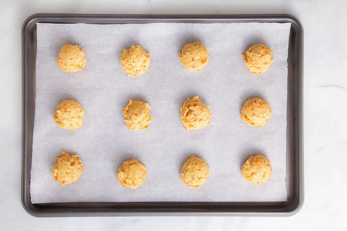 Carrot cake cookie dough on sheet pan.