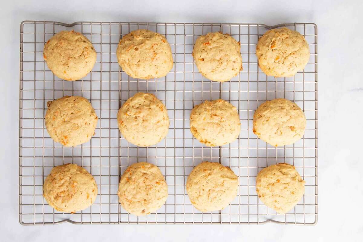 Carrot cake cookies on cooling rack.