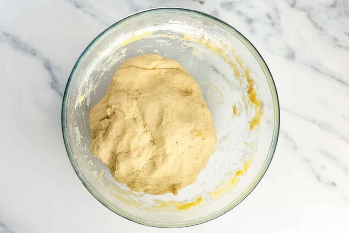 French bread dough in bowl.