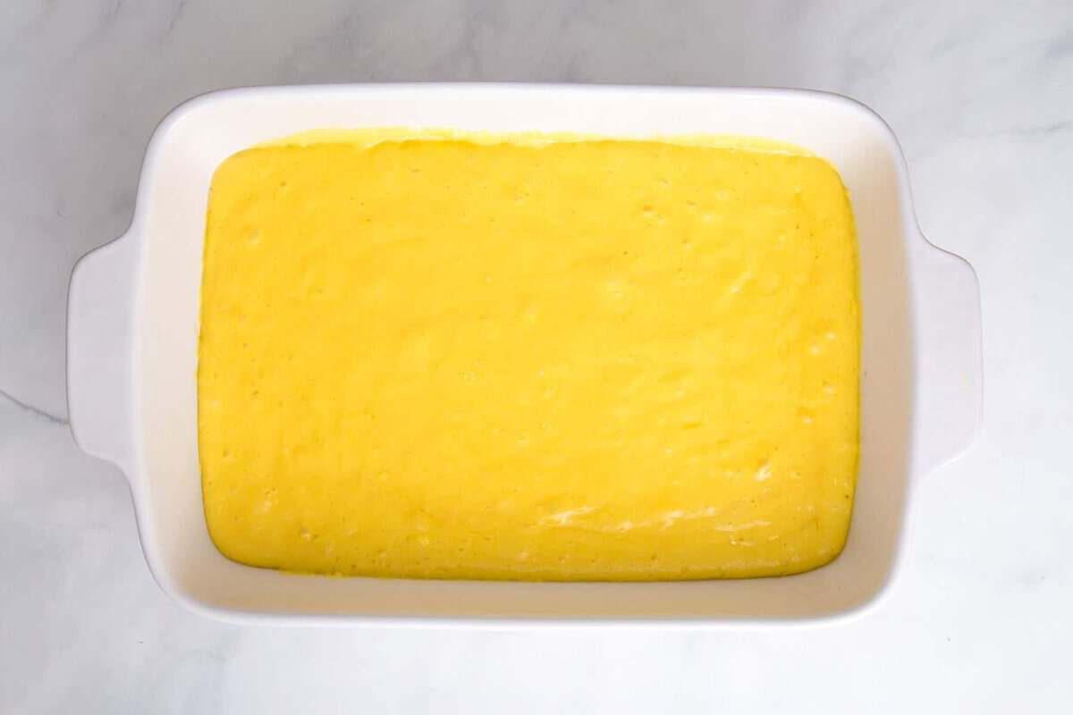Lemonade cake batter in baking dish.