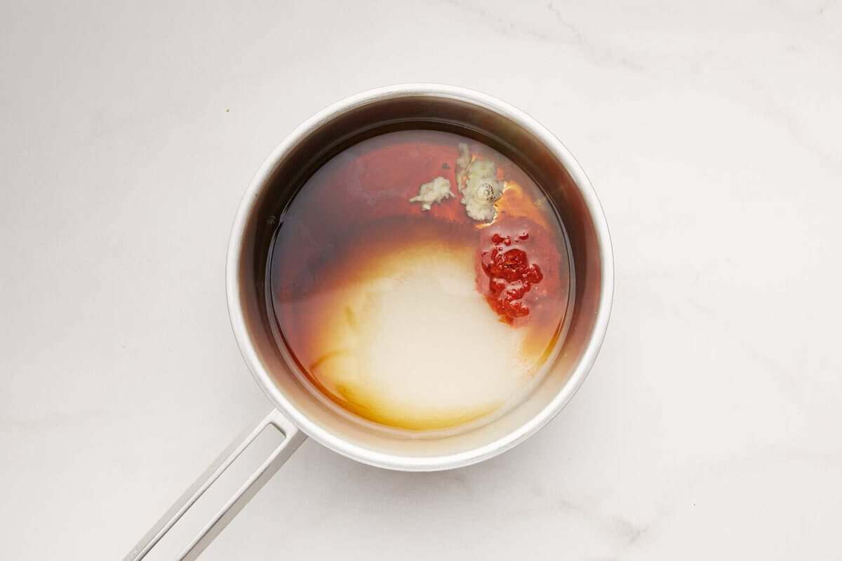 Ingredients for sweet chili sauce in pan.