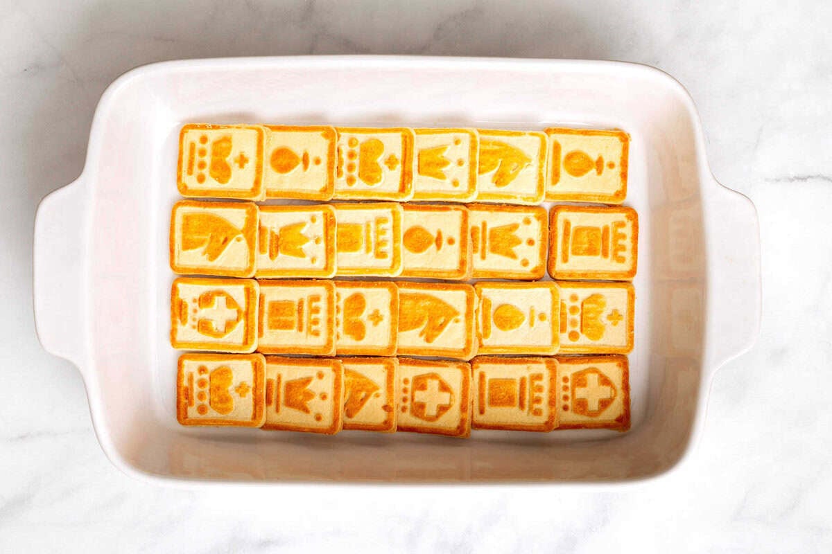 Chessman cookies in casserole dish.