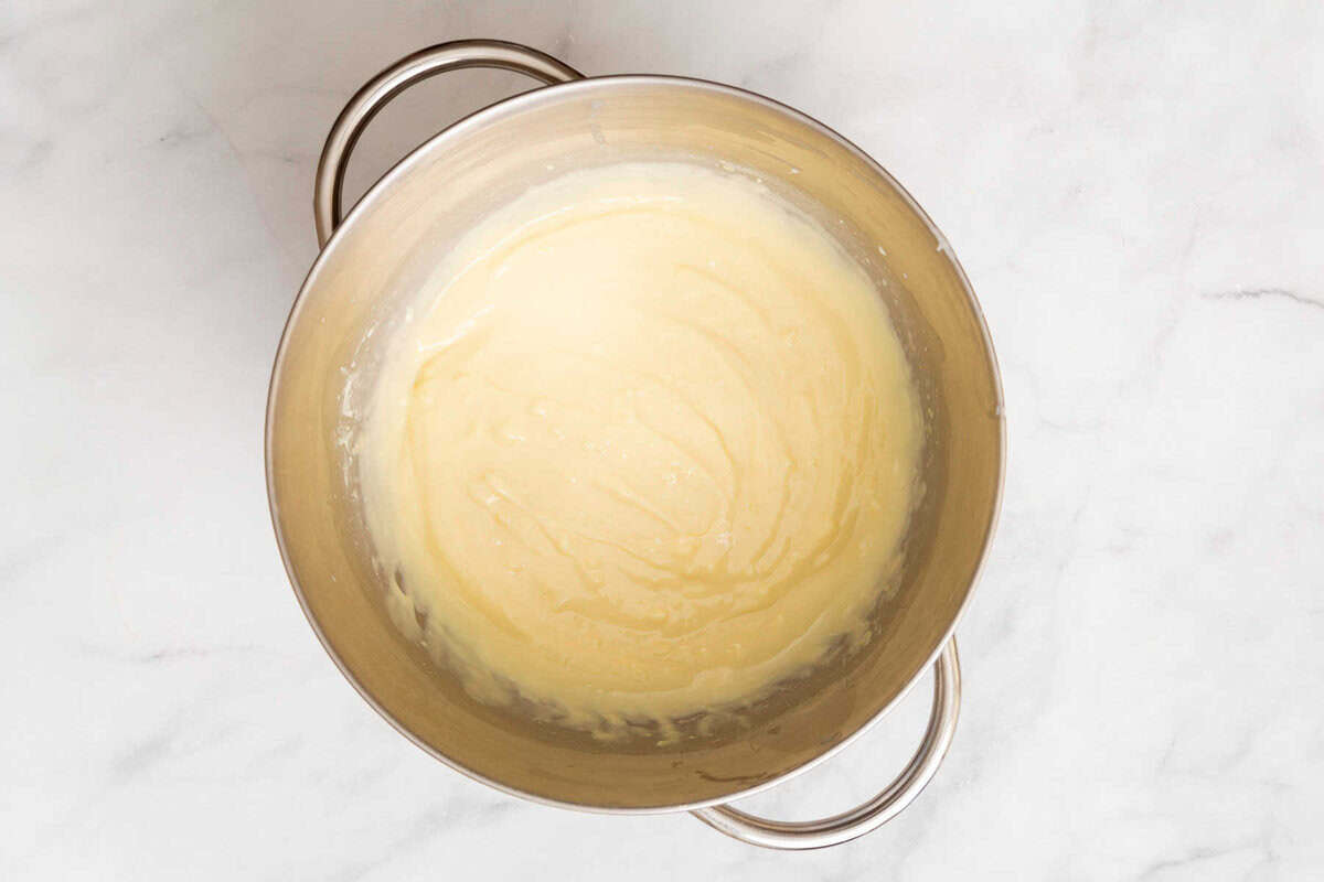 Pudding mixture in mixing bowl.