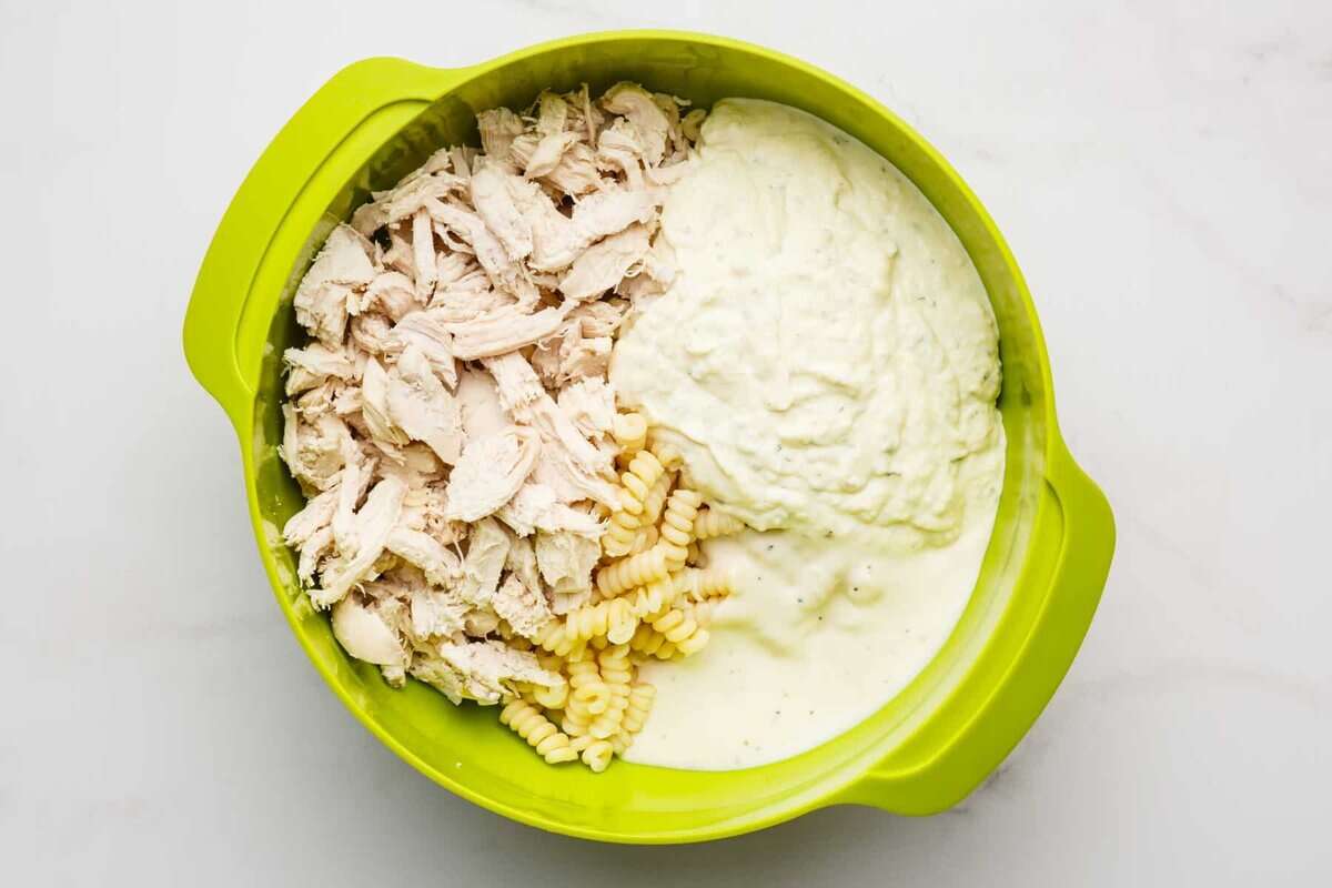 Ingredients for chicken bacon ranch casserole in bowl.